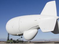 A Raytheon Joint Land Attack Cruise Missile Defense Elevated Netted Sensor System (JLENS) aerostat is pictured at the White Sands Missile Range, New Mexico, in this February 24, 2012 photo obtained on February 1, 2013. A pair of the bulbous, helium-filled "aerostats" - each more than three quarters the length of a football field at 243 feet (74 meters) are to be added to a high-tech shield designed to protect the Washington DC area from air attack. Picture taken February 24, 2012. REUTERS/John Hamilton/DVIDS/Handout (UNITED STATES- - Tags: MILITARY TRANSPORT) ATTENTION EDITORS - THIS IMAGE WAS PROVIDED BY A THIRD PARTY. FOR  EDITORIAL USE ONLY. NOT FOR SALE FOR MARKETING OR ADVERTISING CAMPAIGNS. THIS PICTURE IS DISTRIBUTED EXACTLY AS RECEIVED BY REUTERS, AS A SERVICE TO CLIENTS - RTR3D922
