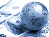 A globe and cash close up