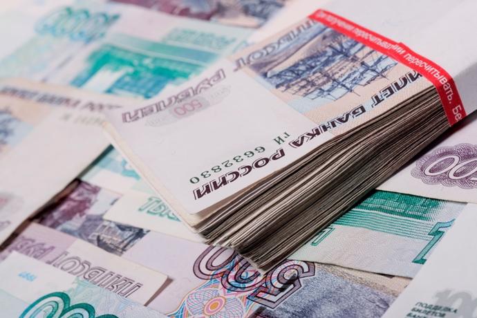 На Московской бирже курс доллара впервые в 2015 году упал ниже 56 рублей