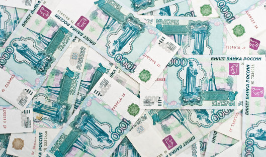 На Московской бирже доллар преодолел психологический рубеж в 60 рублей
