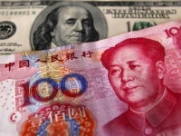 Народный банк Китая укрепил курс юаня по отношению к доллару на 0,5%